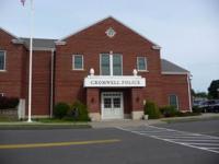Photo of front of brick Cromwell Police Dept building